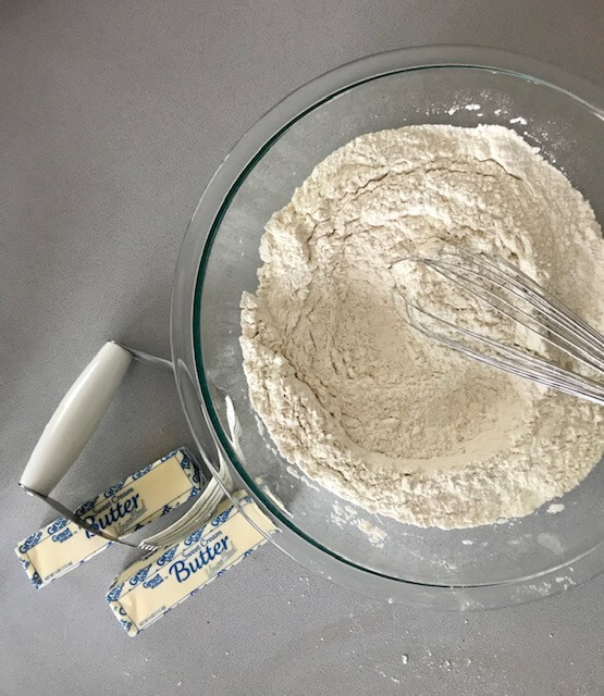 Cutting the butter into the flour for scones